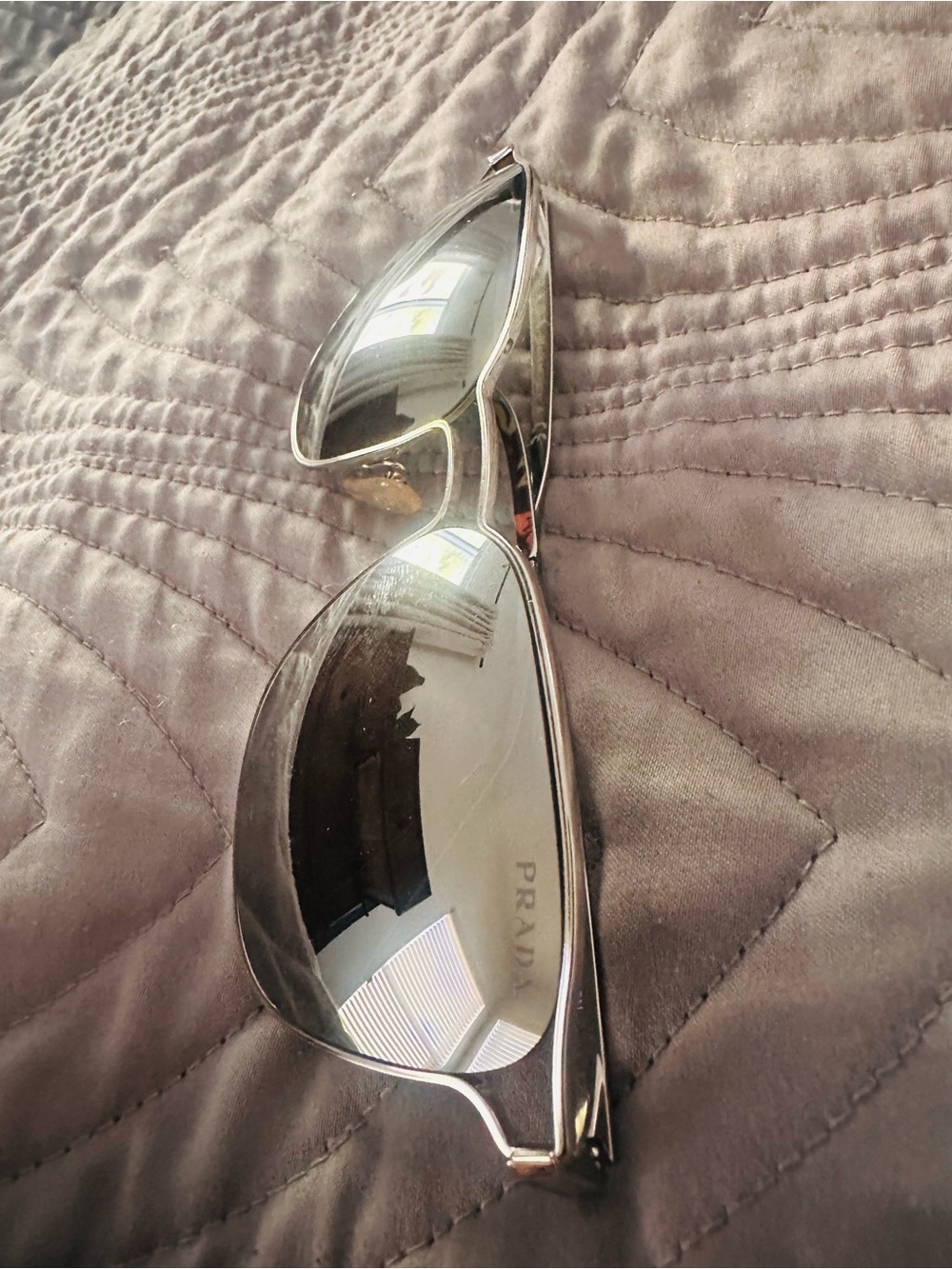 Prada Women's Silver Frame Sunglasses with Mirrored Lenses